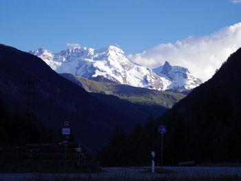 Scenic view of snowcapped mountains against sky