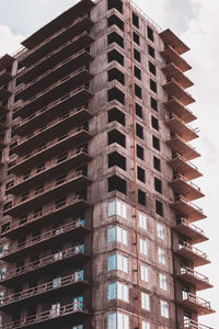 Low angle view of modern building against sky