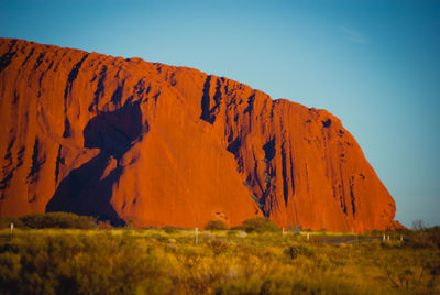 Scenic view of rocks against clear sky