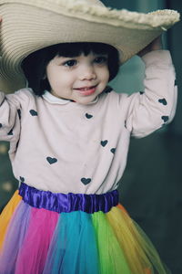 Portrait of cute girl wearing hat