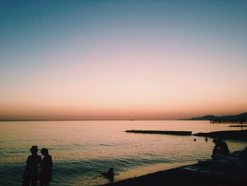Scenic view of sea at sunset