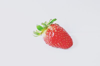 Close-up of strawberry against white background