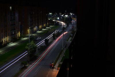 High angle view of illuminated city street at night