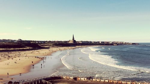 Panoramic view of beach against clear sky