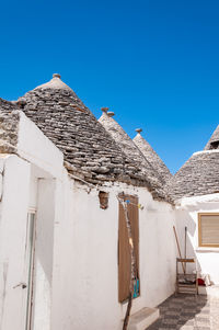 Exterior of house against clear blue sky