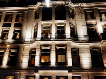 Low angle view of illuminated building at night