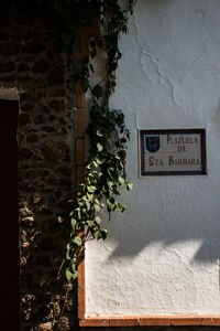 Information sign on wall of building