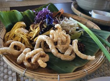 High angle view of vegetables in basket on table