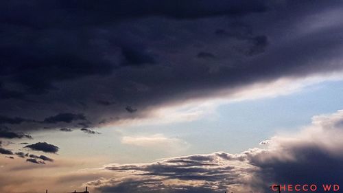 Low angle view of clouds in sky during sunset