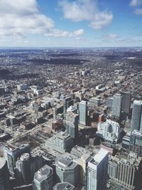 High angle view of modern buildings in city against sky