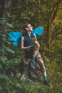 Portrait of a young guy with wings