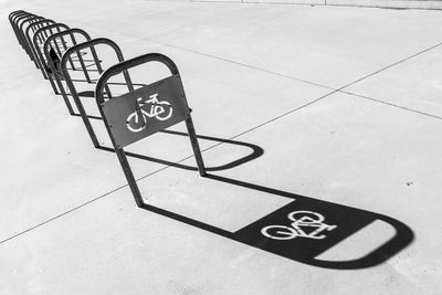 High angle view of bicycle sign on street