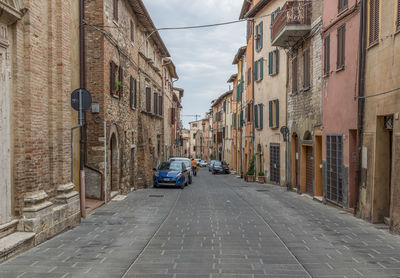 Street amidst buildings in city