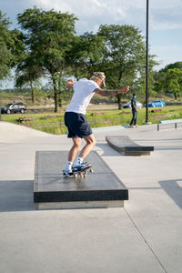 Full length of man skateboarding on skateboard