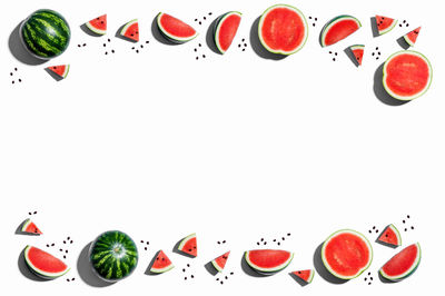 Digital composite image of fruits against white background