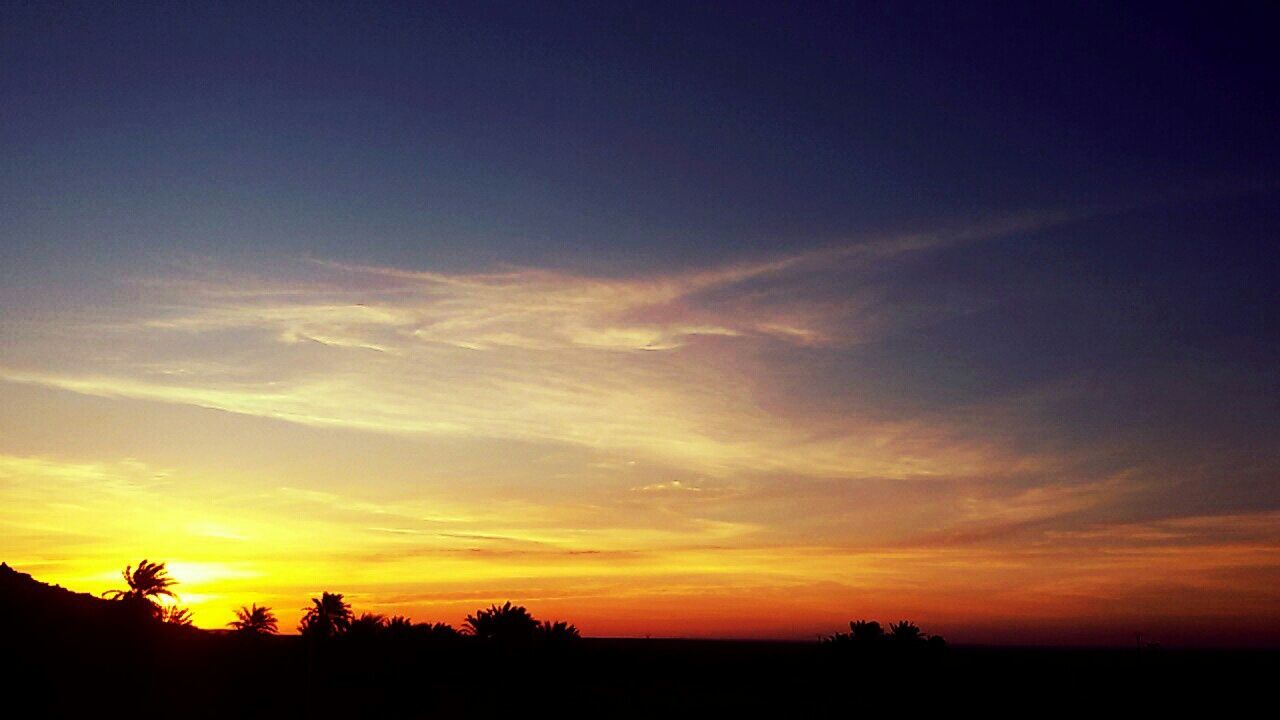 sunset, silhouette, tranquil scene, scenics, tranquility, beauty in nature, sky, orange color, tree, nature, idyllic, landscape, cloud - sky, cloud, majestic, outdoors, dark, dramatic sky, no people, outline