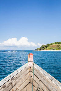 Scenic view of sea against blue sky