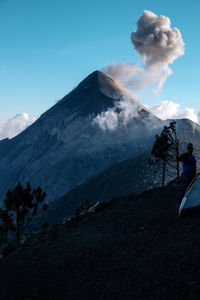 Male hiker against acatenango