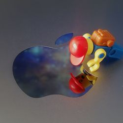 High angle view of fruits on table against blue background