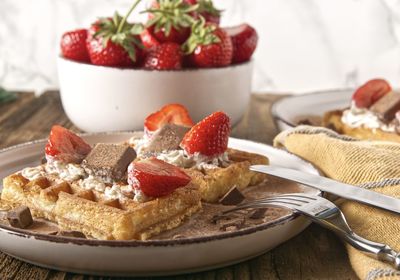 Close-up of strawberries in plate on table