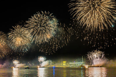 Firework display at night