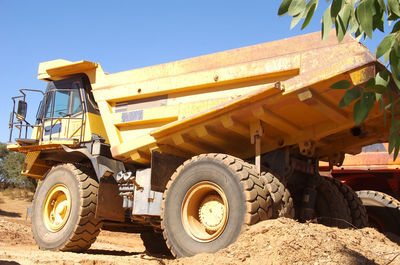 Low angle view of construction site against clear sky