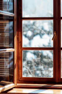 Close-up of glass window of building