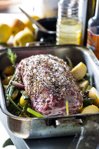 Close-up of roast pork in container