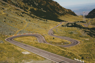 High angle view of vehicles on road against sky