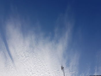 Low angle view of snow against sky