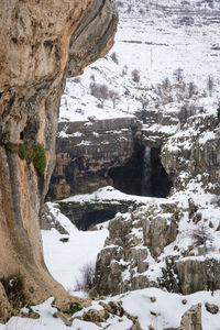 Rock formation on snow covered land