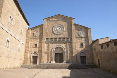 Low angle view of historic building against clear sky