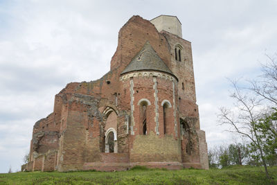 Low angle view of old building against sky