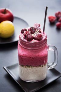 Close-up of ice cream in glass on table