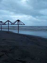 Scenic view of beach against sky