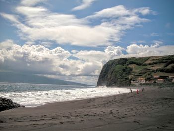 Scenic view of beach against sky