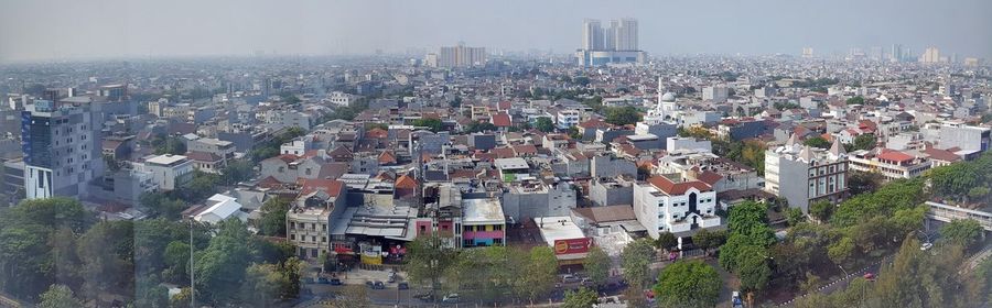 High angle shot of townscape against sky