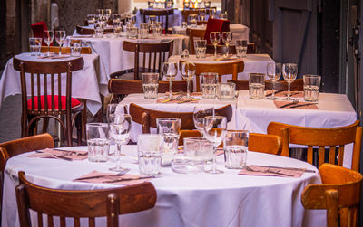 Chairs and tables on table at restaurant