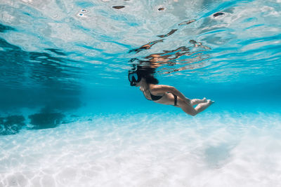 Man swimming in sea