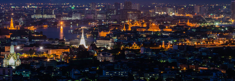 High angle view of illuminated buildings at night