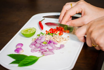 Midsection of woman holding food