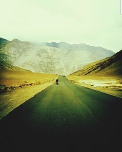 Road passing through mountains