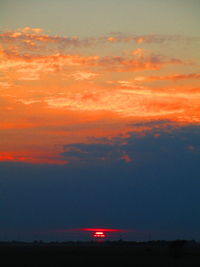 Scenic view of dramatic sky during sunset