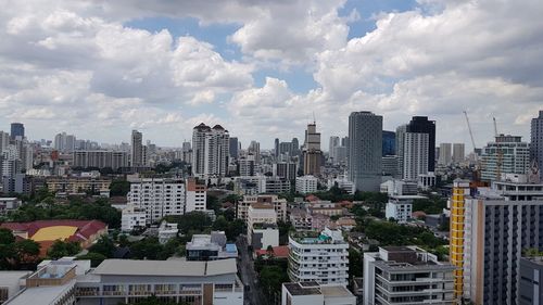 Buildings in city against sky
