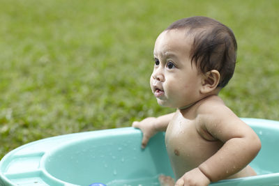 Close-up of cute shirtless boy