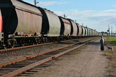 Train on railroad track against sky