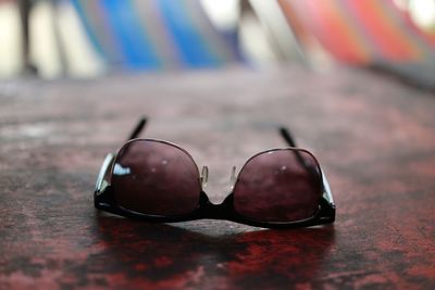 Close-up of sunglasses on table