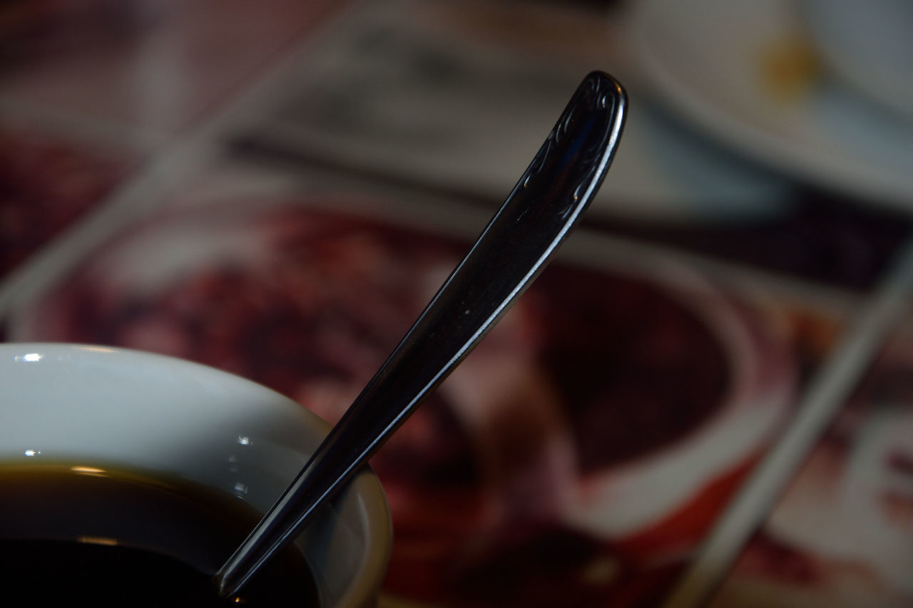 HIGH ANGLE VIEW OF ICE CREAM ON METAL