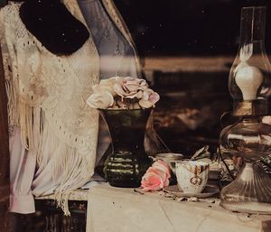 Old fashioned antique shop looking through the window.