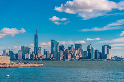 View of buildings in city against sky